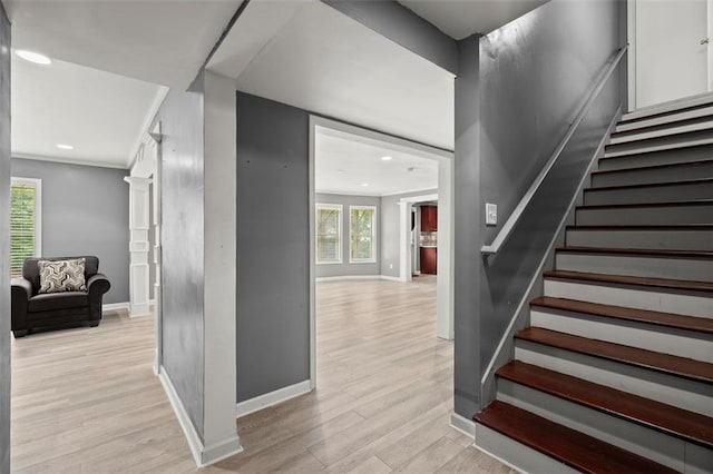 1709 Grove Ct SE, Conyers, GA 30013 - stairway featuring wood finished floors, baseboards, plenty of natural light, and recessed lighting