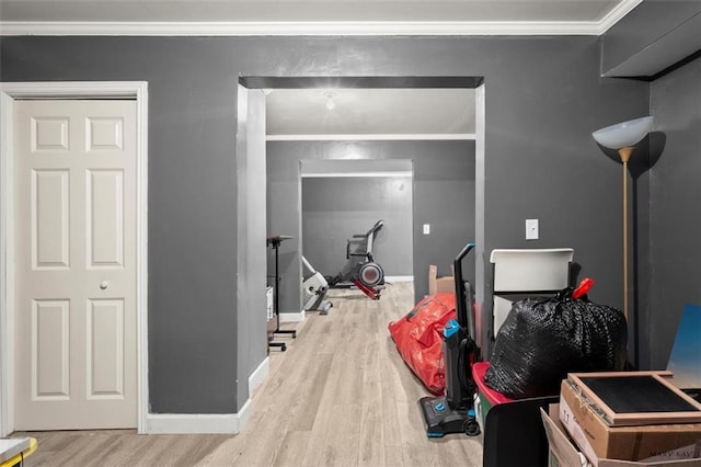 1709 Grove Ct SE, Conyers, GA 30013 - bedroom featuring wood finished floors, crown molding, and baseboards