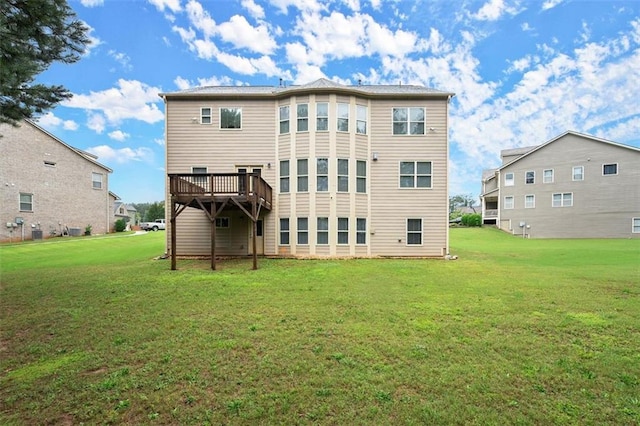 1709 Grove Ct SE, Conyers, GA 30013 - back of house featuring a lawn and a deck