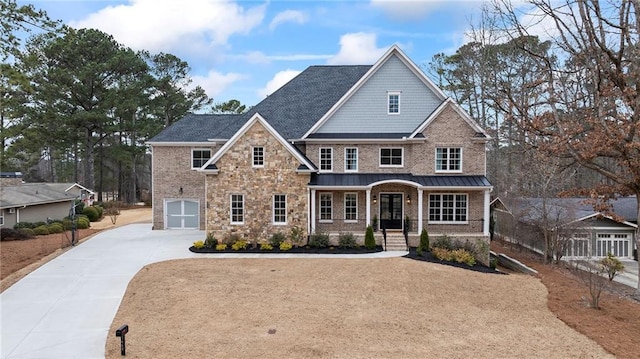 view of front of house with a garage and covered porch