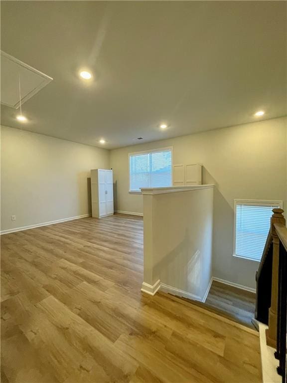 spare room with light wood-type flooring