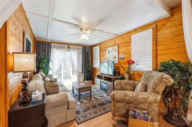 65 Bear Mountain Trl, Cleveland, GA 30528 - living area featuring wood finished floors, a ceiling fan, and wood walls