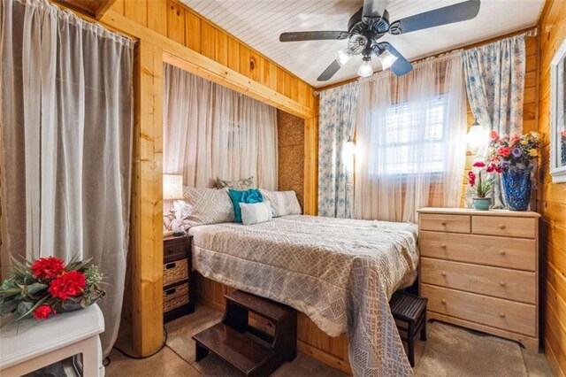 65 Bear Mountain Trl, Cleveland, GA 30528 - bedroom featuring wooden walls and a ceiling fan