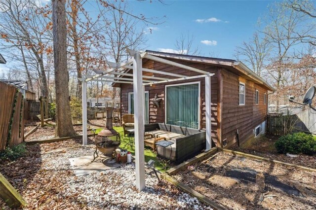 65 Bear Mountain Trl, Cleveland, GA 30528 - exterior space featuring a patio, a fenced backyard, a pergola, and an outdoor hangout area