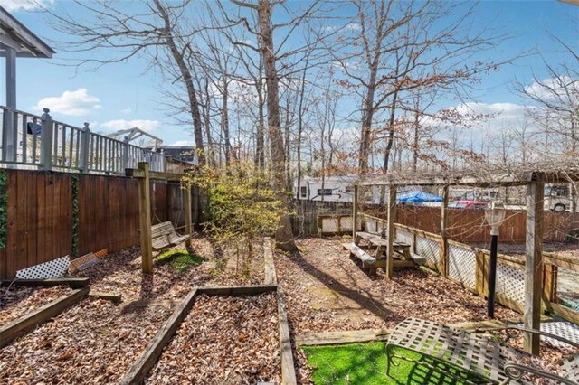 65 Bear Mountain Trl, Cleveland, GA 30528 - view of yard featuring a vegetable garden and a fenced backyard