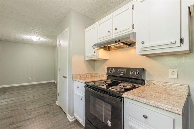 kitchen featuring white cabinets, dark hardwood / wood-style floors, black range with electric stovetop, and a textured ceiling