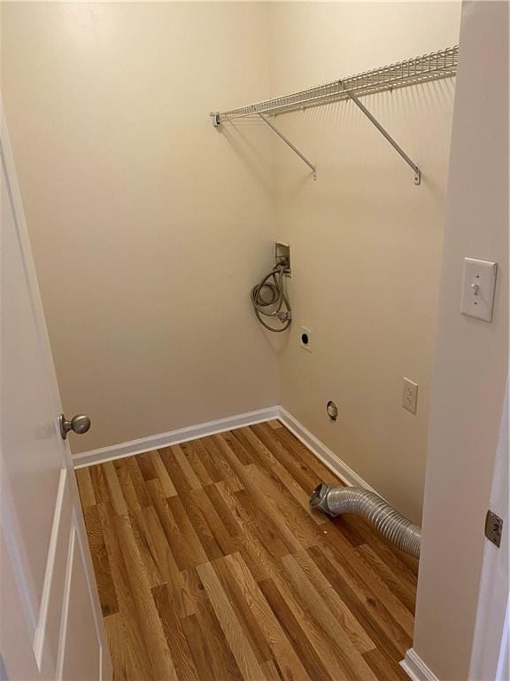 laundry area featuring hookup for a washing machine, hardwood / wood-style flooring, and hookup for an electric dryer