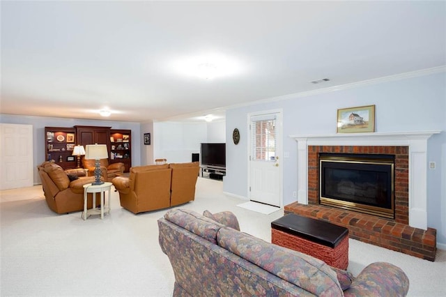 living area with crown molding, carpet flooring, a fireplace, and visible vents