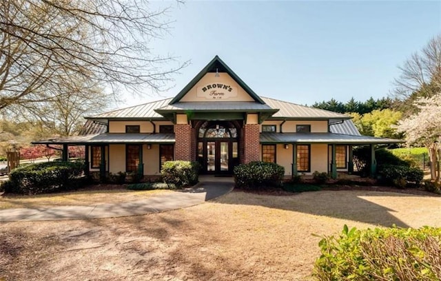 view of building exterior with driveway