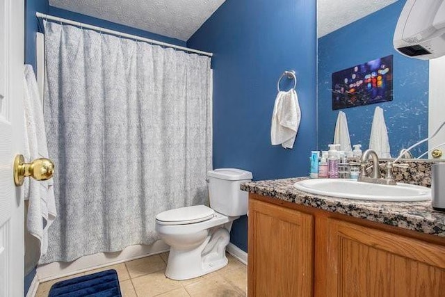 full bathroom with vanity, shower / bath combination with curtain, tile patterned floors, toilet, and a textured ceiling