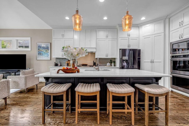 1120 Cordia Ave NW, Atlanta, GA 30318 - kitchen with stainless steel appliances, a sink, white cabinetry, dark wood-style flooring, and recessed lighting