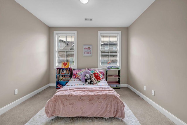 1120 Cordia Ave NW, Atlanta, GA 30318 - bedroom with light carpet and baseboards