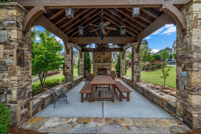1120 Cordia Ave NW, Atlanta, GA 30318 - view of patio / terrace featuring an outdoor stone fireplace and a gazebo