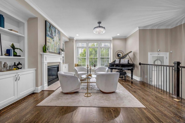 1120 Cordia Ave NW, Atlanta, GA 30318 - living area featuring crown molding, a glass covered fireplace, dark wood-style flooring, built in features, and baseboards