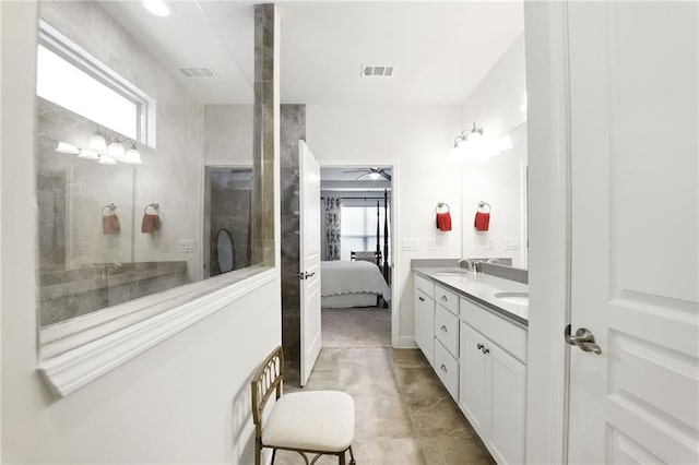 full bathroom with connected bathroom, double vanity, and ceiling fan