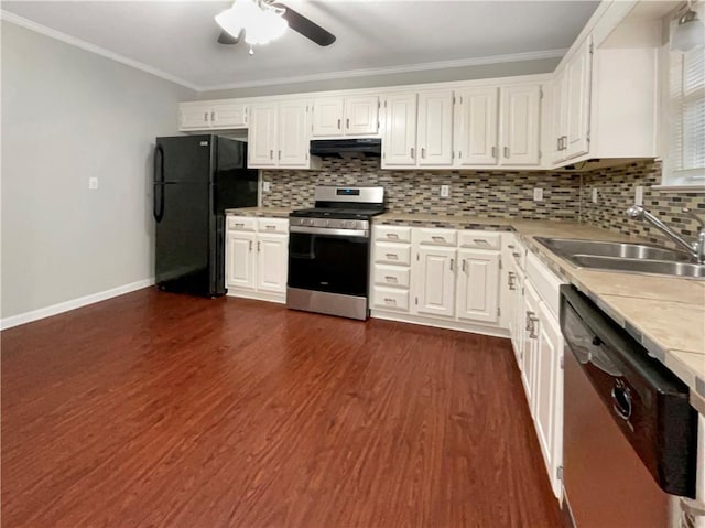 kitchen with decorative backsplash, appliances with stainless steel finishes, white cabinetry, and sink