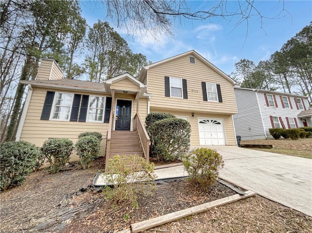 split level home with a garage