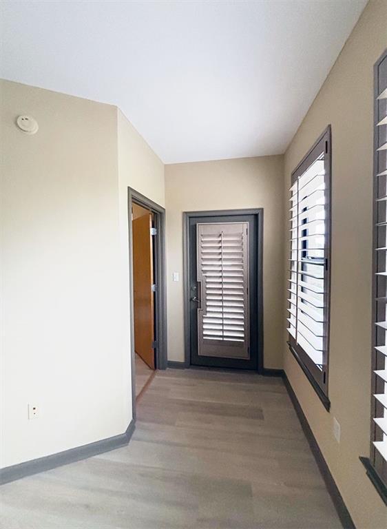 interior space with hardwood / wood-style flooring