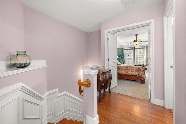 hallway featuring light hardwood / wood-style flooring