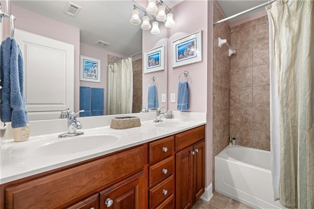 bathroom featuring shower / tub combo, vanity, and tile patterned flooring