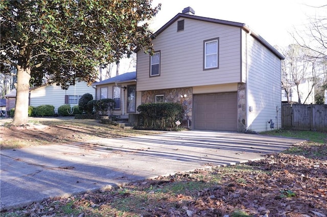 split level home featuring a garage