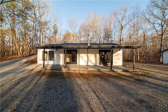 view of front of home with metal roof