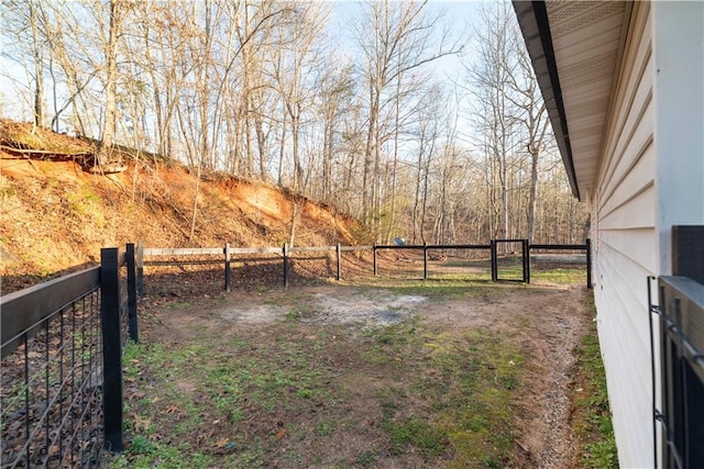 view of yard with a gate and fence