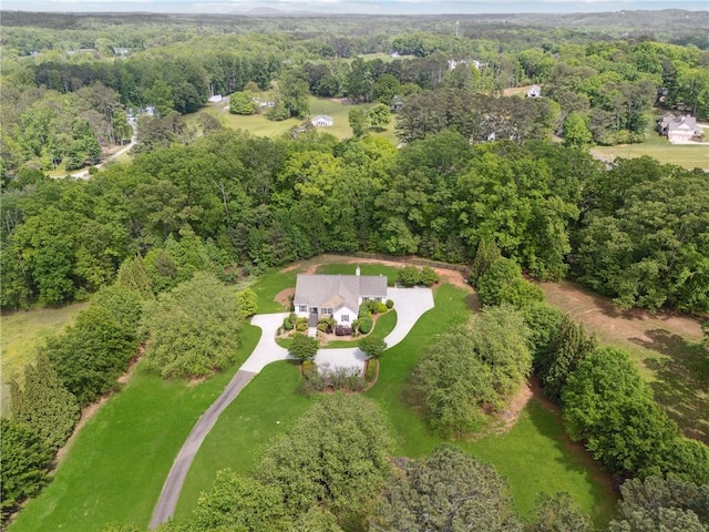 drone / aerial view with a forest view
