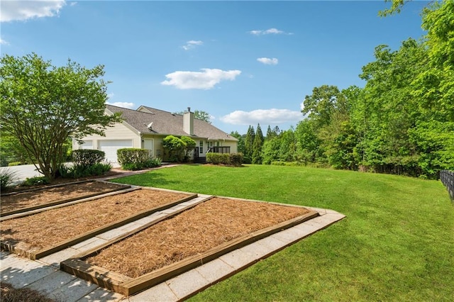 view of yard with an attached garage