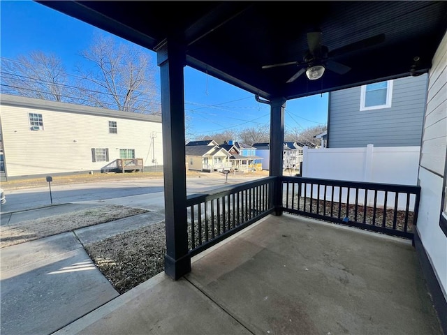 view of patio / terrace with ceiling fan and a porch