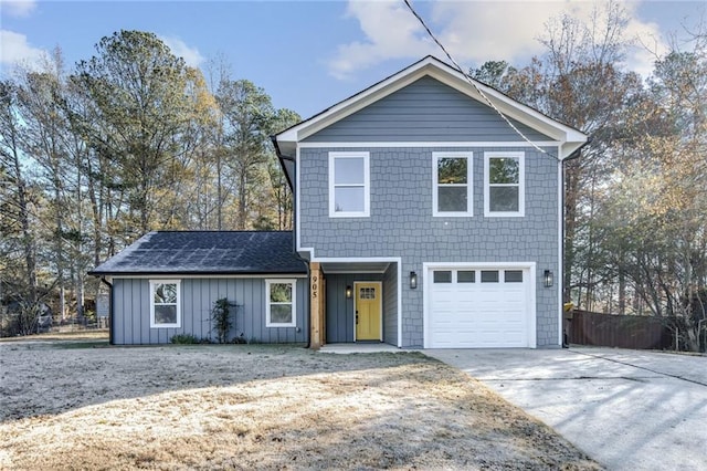 view of front property with a garage