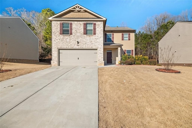 view of front facade featuring a garage and a front yard