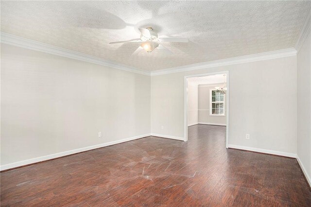 empty room with ceiling fan with notable chandelier, dark hardwood / wood-style floors, crown molding, and a textured ceiling