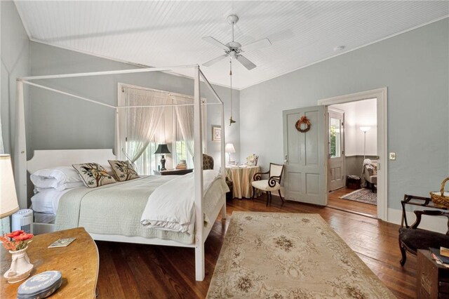 bedroom featuring ceiling fan, ornamental molding, and hardwood / wood-style flooring