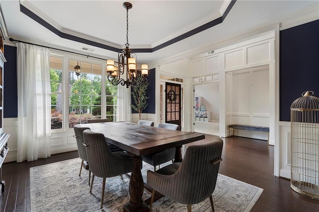 416 Battlefield Creek Dr, Marietta, GA 30064 - dining area with a decorative wall, ornamental molding, a chandelier, dark wood-style floors, and a tray ceiling