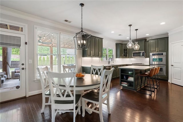 416 Battlefield Creek Dr, Marietta, GA 30064 - dining room with dark wood-style floors, ornamental molding, a chandelier, and recessed lighting