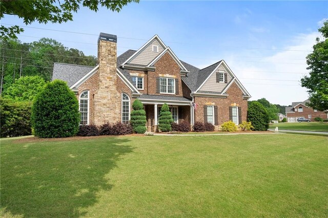 416 Battlefield Creek Dr, Marietta, GA 30064 - view of front of property with a chimney, a front lawn, and brick siding