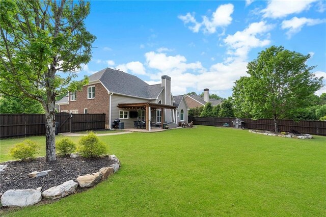 416 Battlefield Creek Dr, Marietta, GA 30064 - back of house with a fenced backyard, a patio, and a chimney
