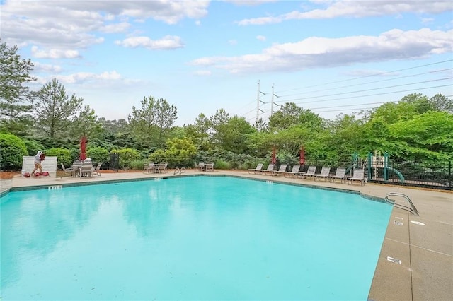 416 Battlefield Creek Dr, Marietta, GA 30064 - community pool with view of wooded area and a patio area