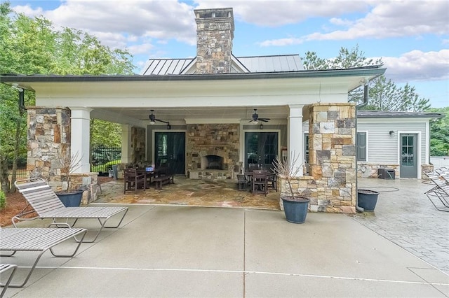 416 Battlefield Creek Dr, Marietta, GA 30064 - view of patio / terrace featuring ceiling fan, outdoor dining area, and an outdoor stone fireplace