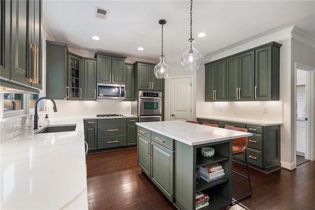 416 Battlefield Creek Dr, Marietta, GA 30064 - kitchen featuring appliances with stainless steel finishes, crown molding, open shelves, a center island, and decorative backsplash