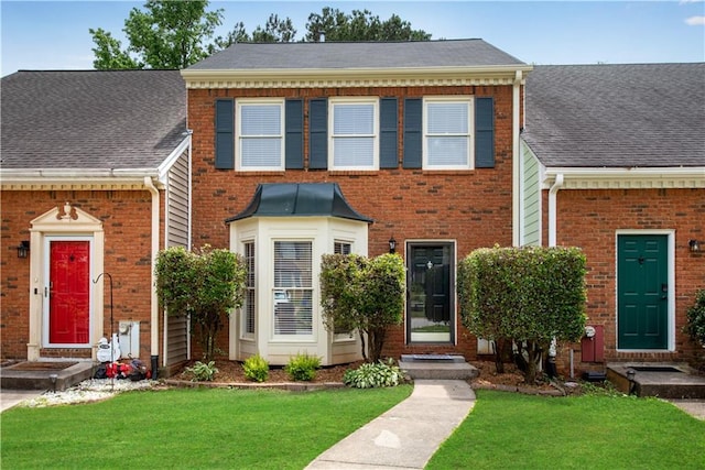 1368 Poplar Pointe SE, Smyrna, GA 30082 - view of front of property with brick siding, a front lawn, and a shingled roof