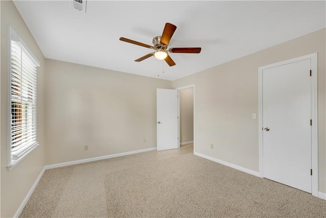 1368 Poplar Pointe SE, Smyrna, GA 30082 - unfurnished bedroom featuring multiple windows, light colored carpet, and baseboards