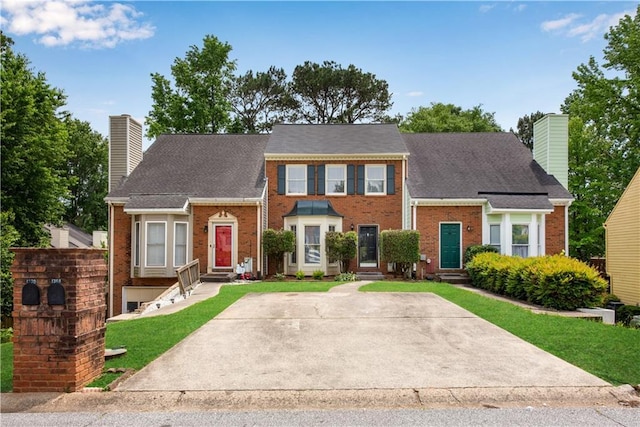 1368 Poplar Pointe SE, Smyrna, GA 30082 - view of front of house with a chimney, entry steps, and brick siding