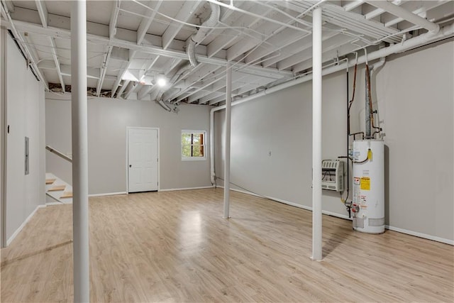 1368 Poplar Pointe SE, Smyrna, GA 30082 - below grade area with water heater, wood finished floors, stairway, and baseboards