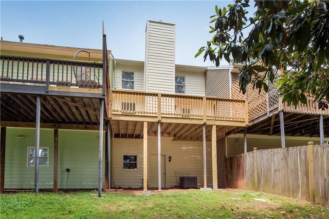 1368 Poplar Pointe SE, Smyrna, GA 30082 - back of property with a wooden deck, a chimney, and central AC unit
