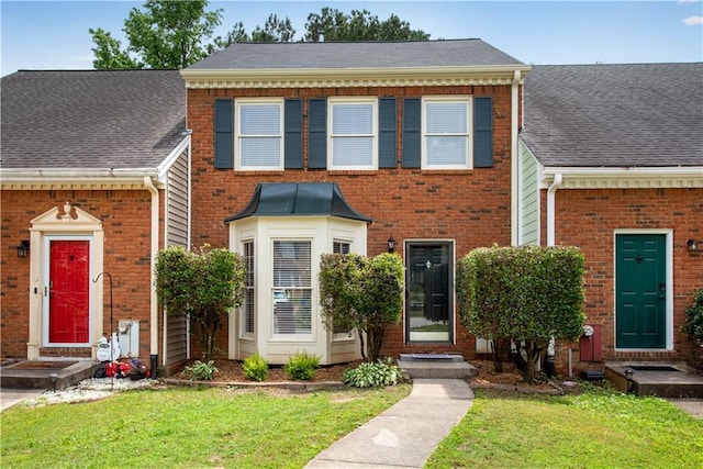 1368 Poplar Pointe SE, Smyrna, GA 30082 - view of front of property with a front lawn, brick siding, and roof with shingles