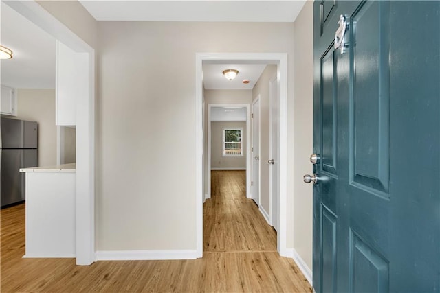 1368 Poplar Pointe SE, Smyrna, GA 30082 - hallway with light wood-style flooring and baseboards