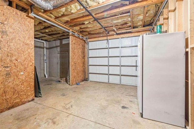 garage with freestanding refrigerator