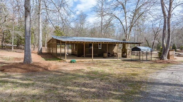 exterior space featuring an outdoor structure